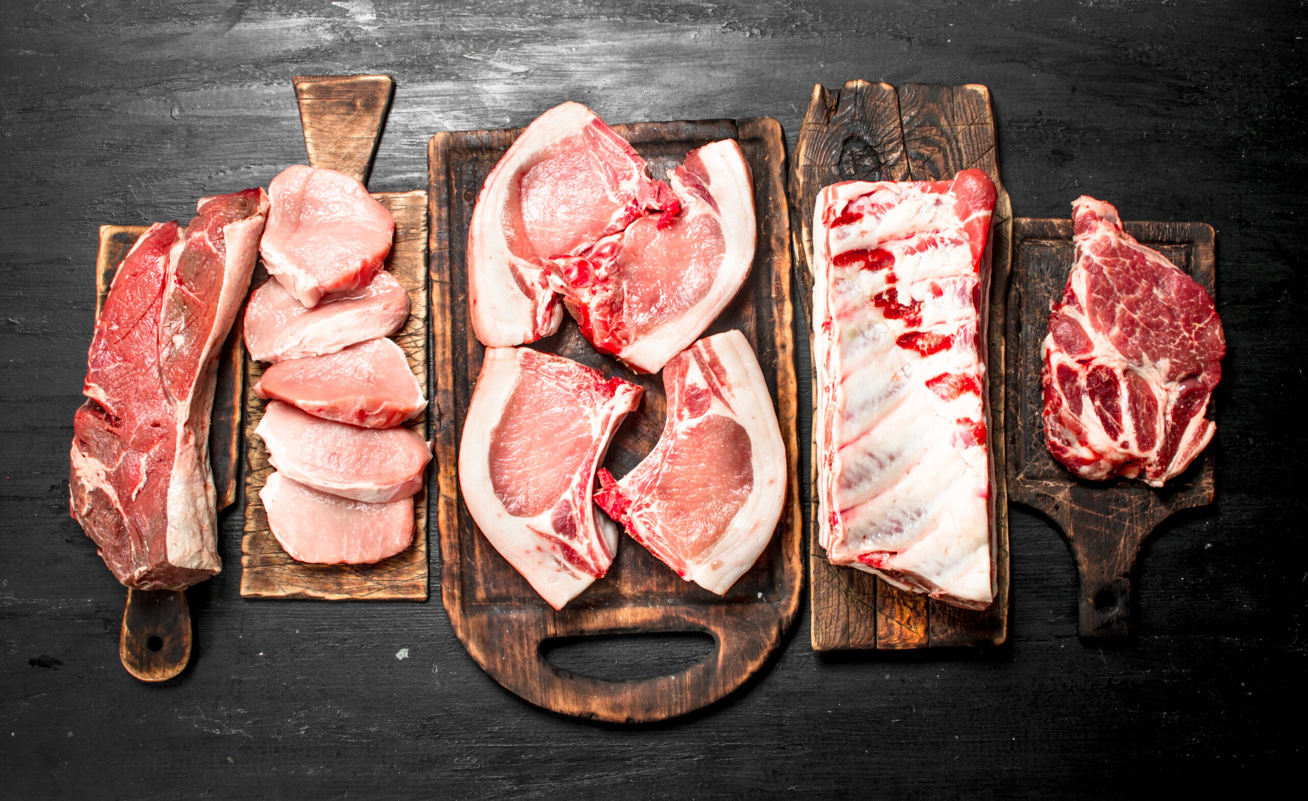 Different types of raw pork meat and beef. Image placeholder indicating a need for a photo, often used in design or content creation to signify missing visual content.